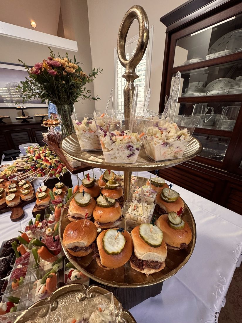 Sliders and appetizers on a styled buffet