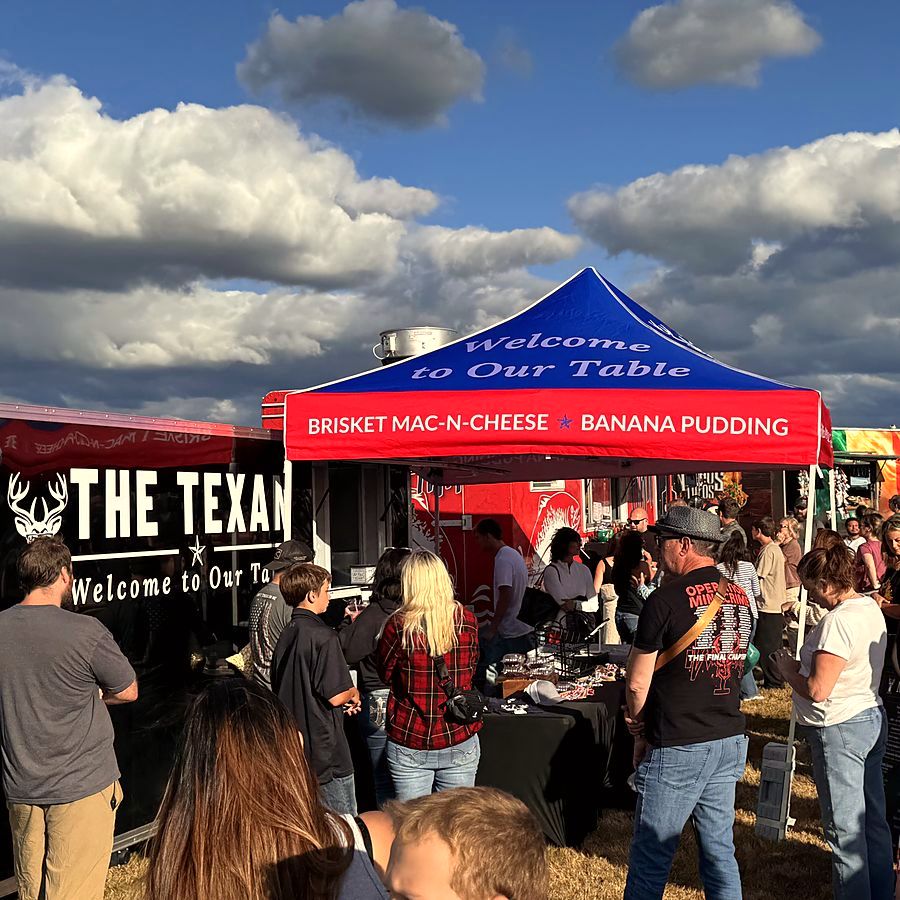 The Texan Express trailer serving a crowd